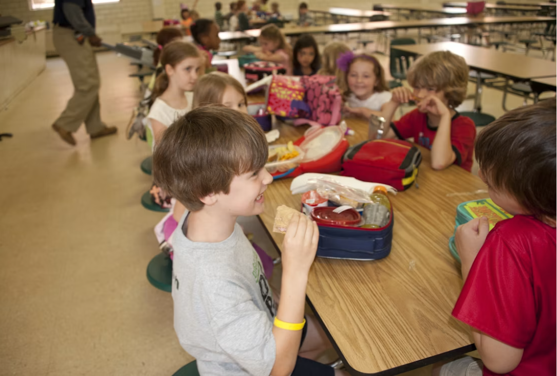 Children with their supplies at Tots N Us Academy