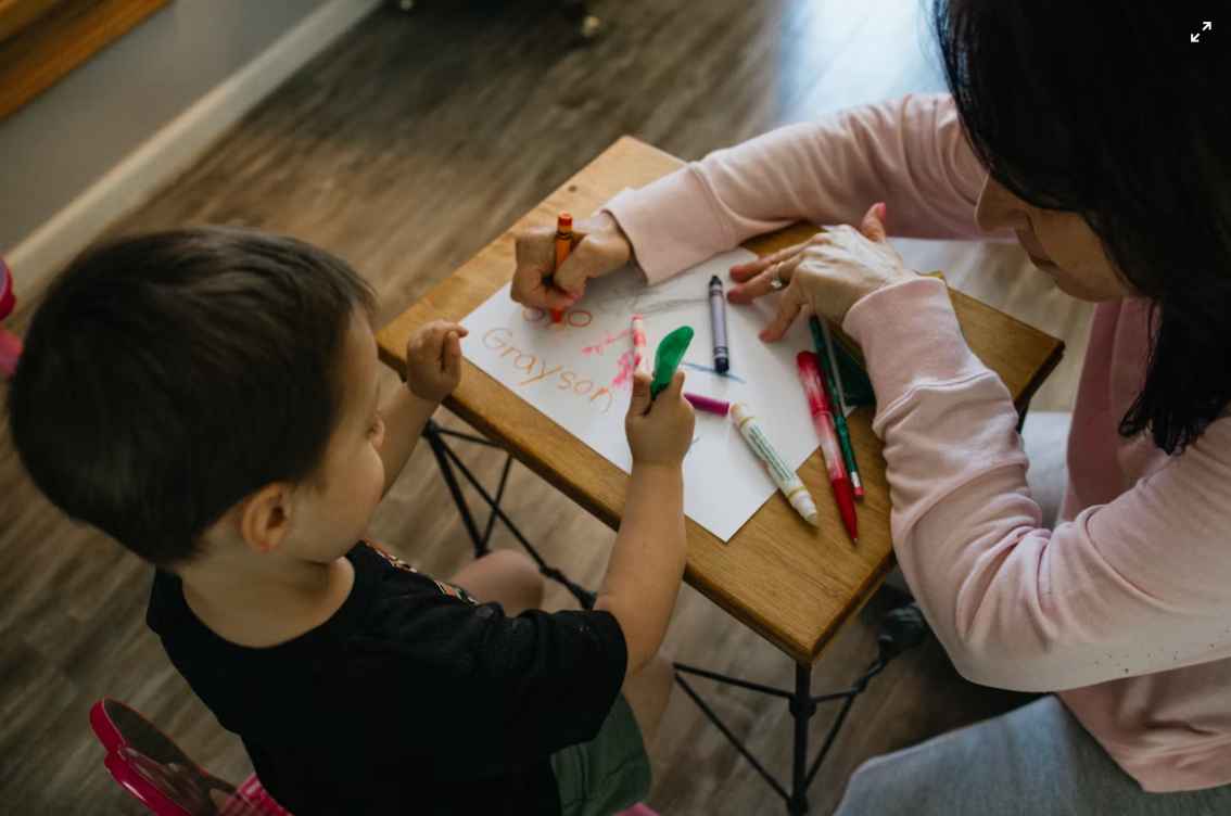 Happy children learning at Tots N Us Children's Academy in Fairfax VA